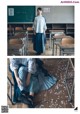 A woman sitting on the floor in front of a classroom.