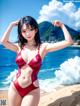 A woman in a red bathing suit standing on a beach.